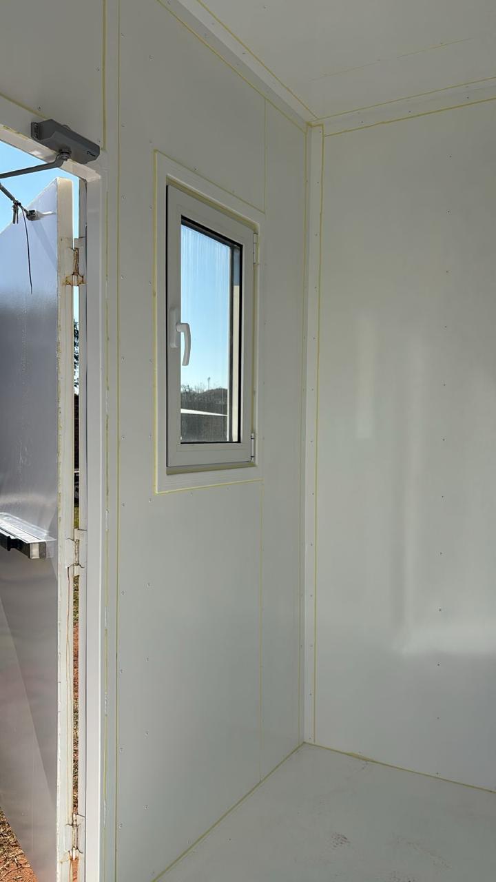 Operator cabin entrance door open, showing interior