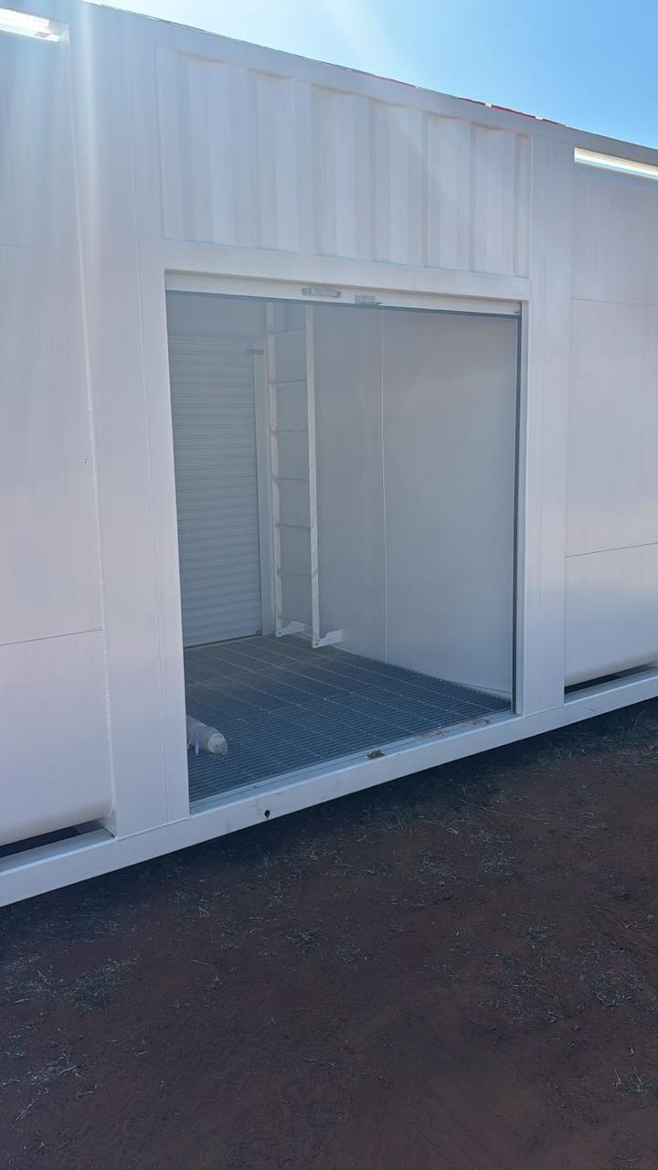 Operator cabin with external window and entrance door